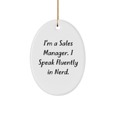 Funny Sales Manager Gifts, 'I'm A Sales Manager. I Speak Fluently In genius.' Oval Ornament for Christmas, Gifts from Friends to Family - Image 1